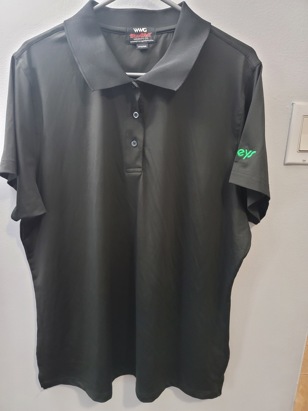 Men's Black Polo Shirt with Subtle Sleeve Logo
